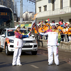 Torch with the Olympic flame in our hands!